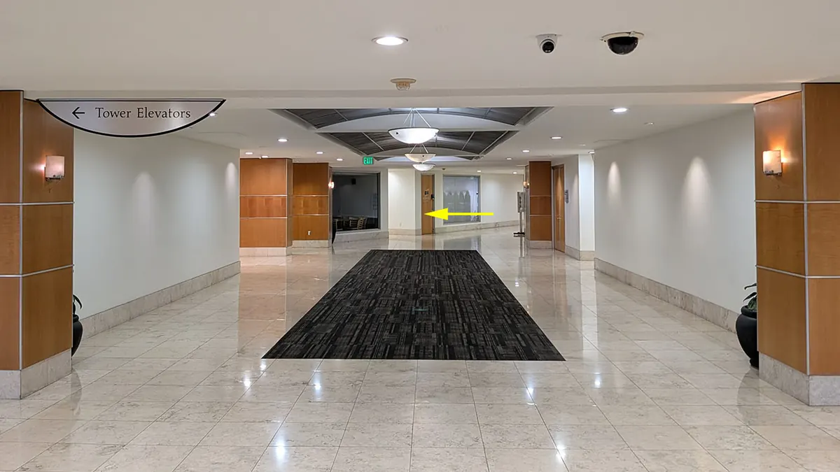 Suite 110 check-in near the Information Desk