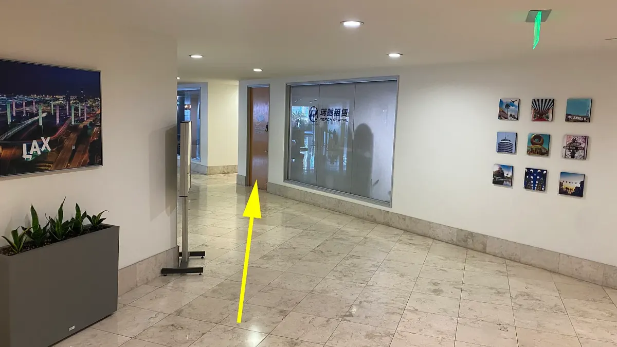Walking through the lobby to the Reach Rental office