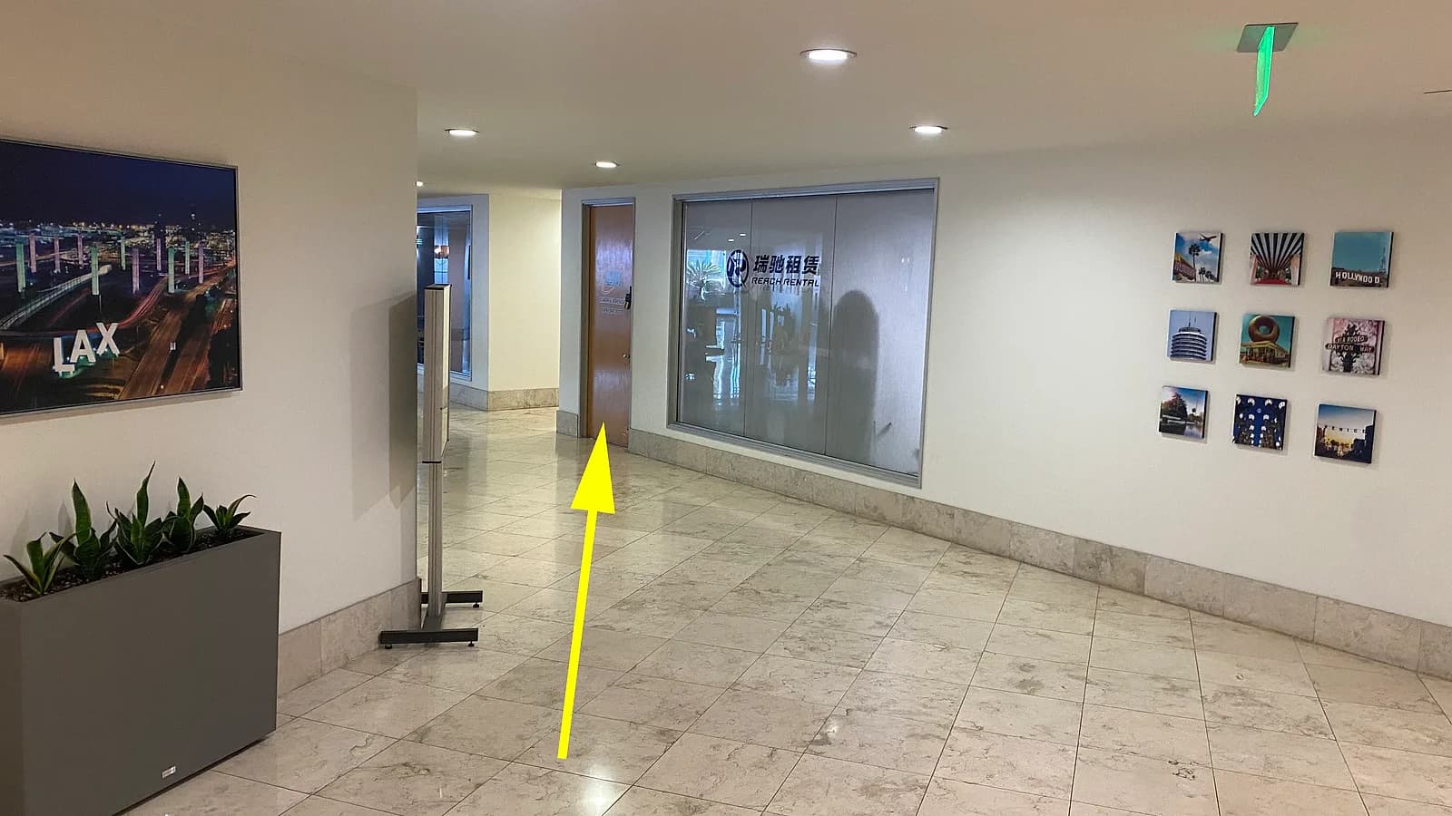 Walking through the lobby to the Reach Rental office