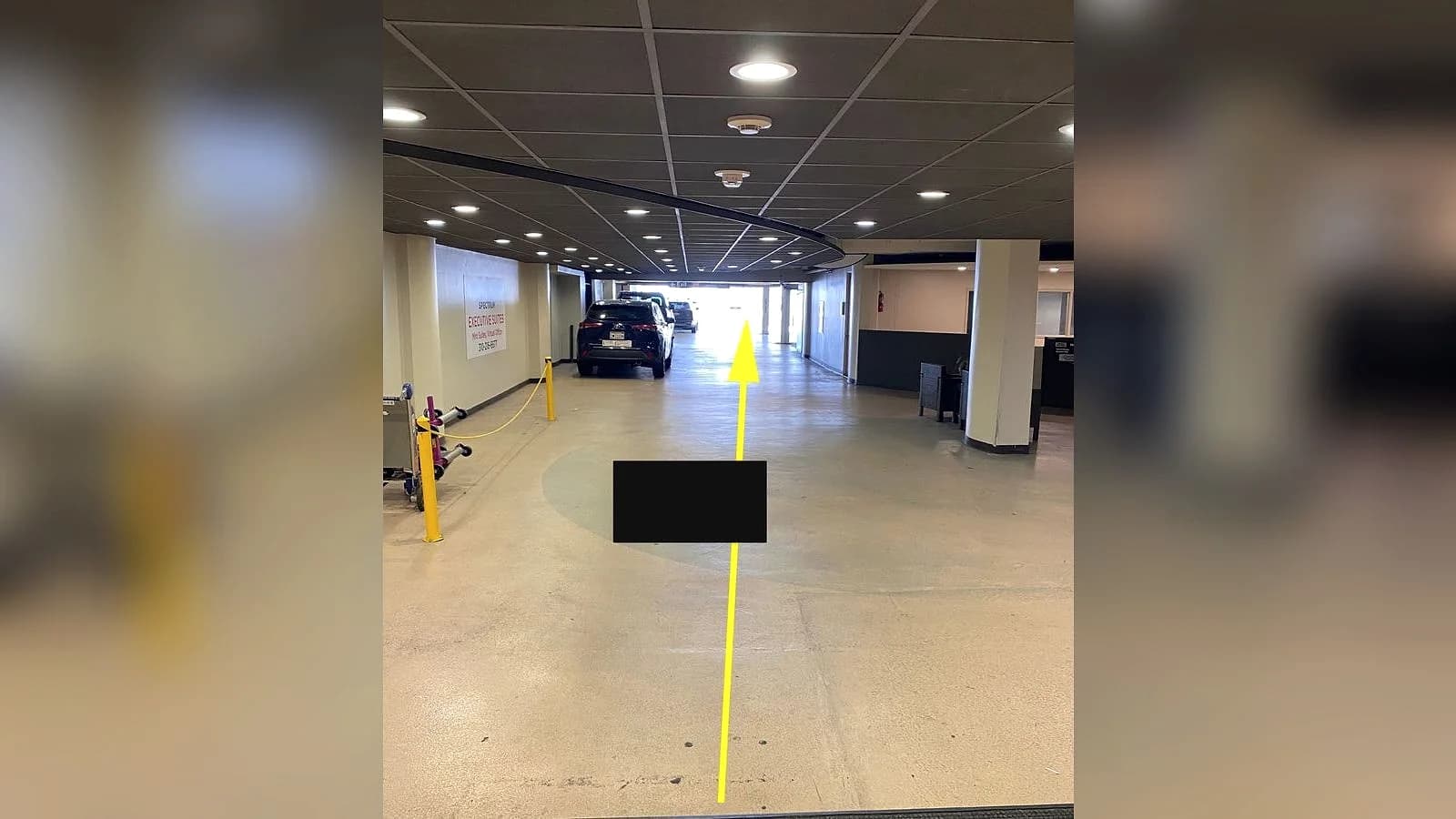 Continue along the indoor driveway
